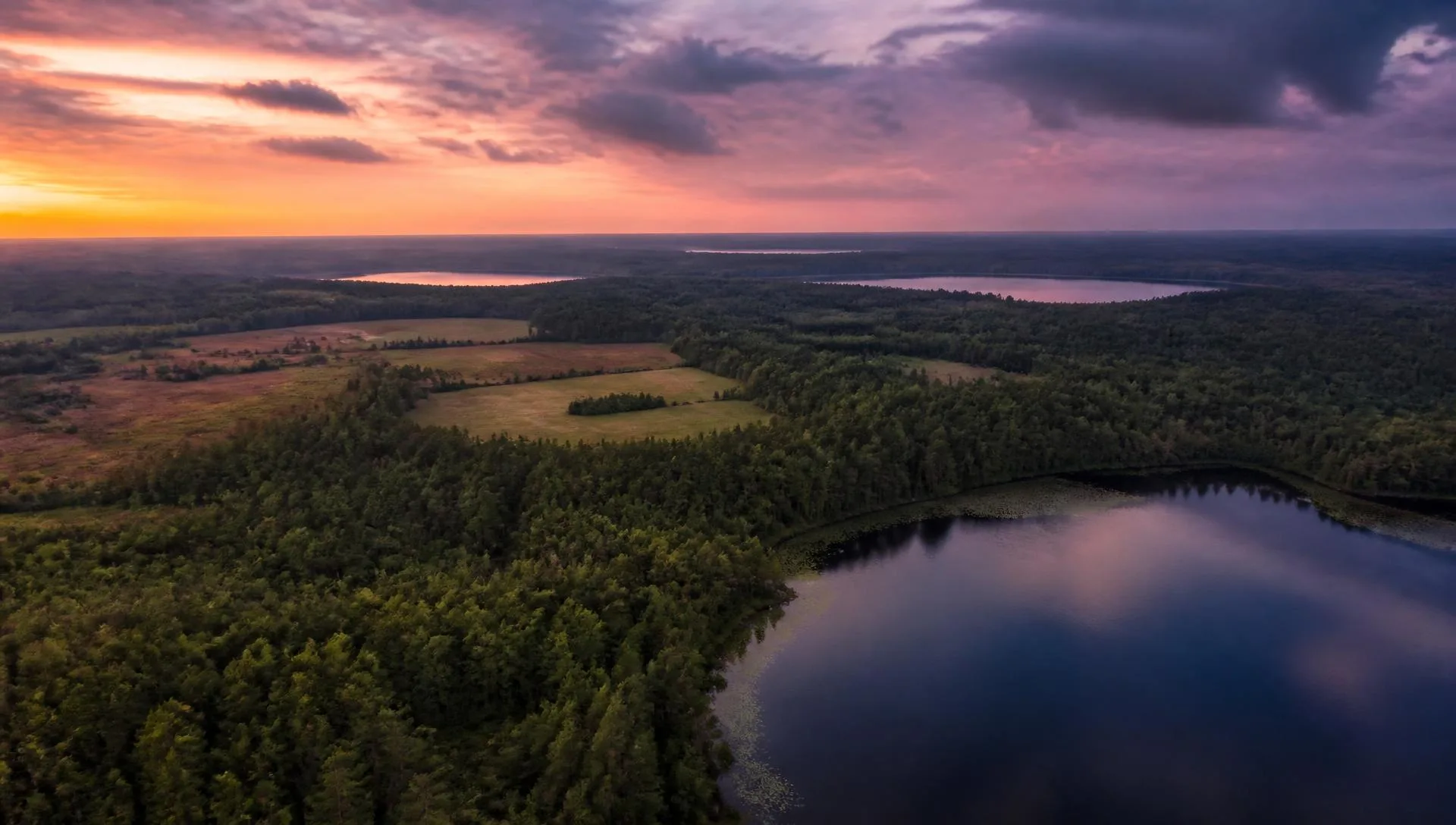 Aerial view of Florida land and lakes at dusk